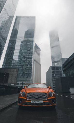 Обои 1200x2000 Bentley, город, туман