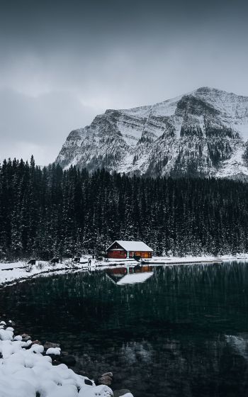 Обои 1200x1920 дом у озера, снег, зима