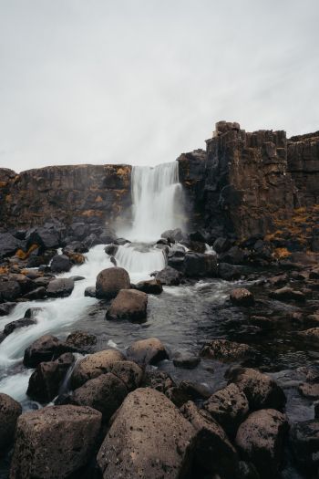 Iceland, waterfall, stones Wallpaper 640x960