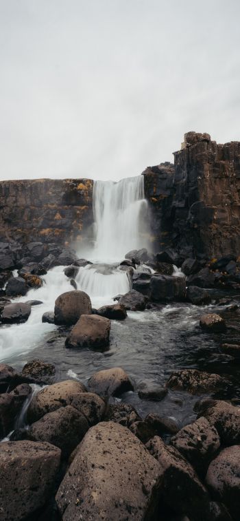 Iceland, waterfall, stones Wallpaper 1125x2436