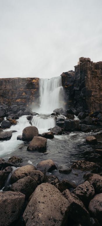 Iceland, waterfall, stones Wallpaper 1440x3200