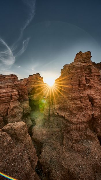 sunlight, rocks, landscape Wallpaper 640x1136