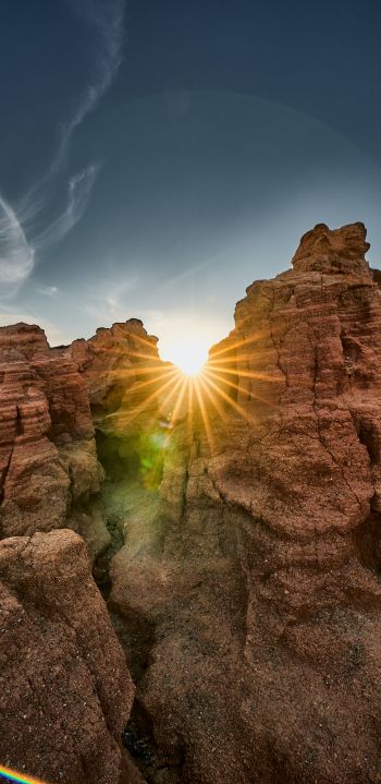sunlight, rocks, landscape Wallpaper 1440x2960