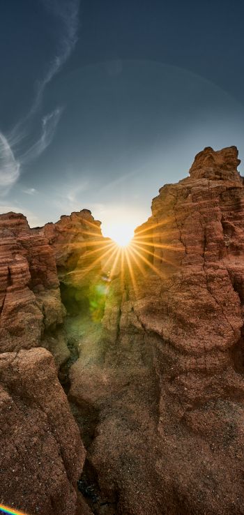 sunlight, rocks, landscape Wallpaper 1080x2280