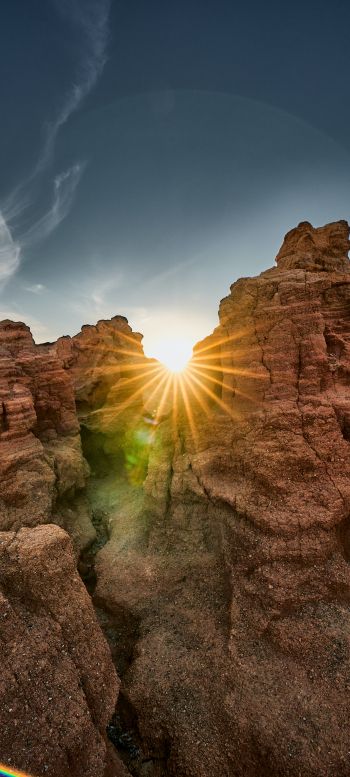 sunlight, rocks, landscape Wallpaper 1080x2400