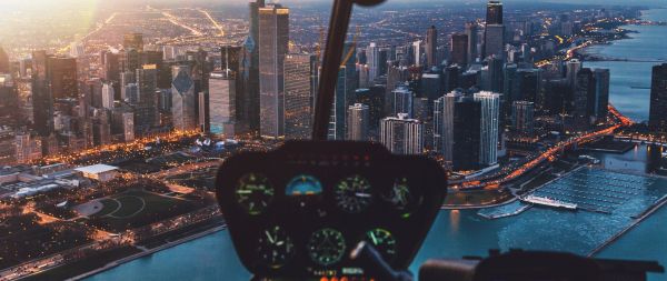 helicopter cockpit, skyscrapers, flight Wallpaper 2560x1080
