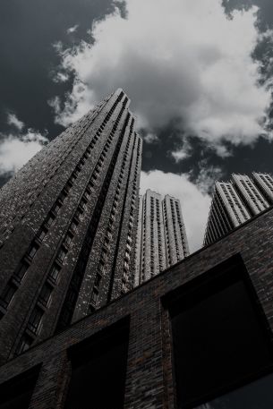 skyscraper, building, high-rise, brick, clouds, sadness Wallpaper 3767x5650