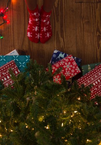 gifts, Christmas tree, holidays, feet, socks, bright light bulbs Wallpaper 1668x2388