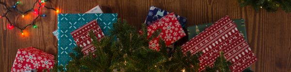 gifts, Christmas tree, holidays, feet, socks, bright light bulbs Wallpaper 1590x400