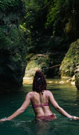 girl, rest, water, rocks Wallpaper 600x1024