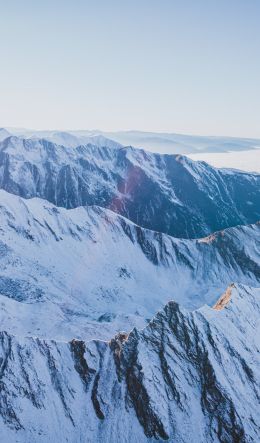 snow in the mountains, mountains, winter, drone view Wallpaper 600x1024