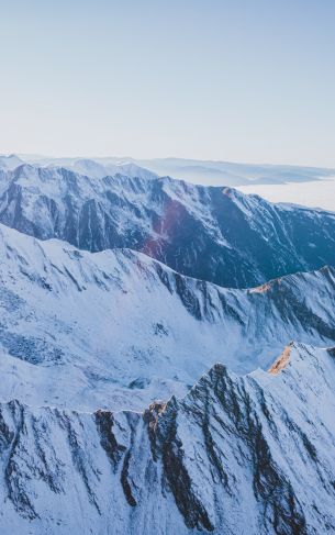 Обои 1752x2800 снег в горах, горы, зима, вид с дрона