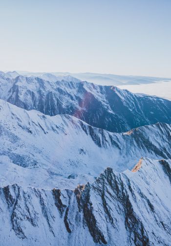 Обои 1640x2360 снег в горах, горы, зима, вид с дрона