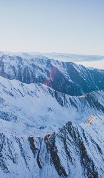 snow in the mountains, mountains, winter, drone view Wallpaper 600x1024
