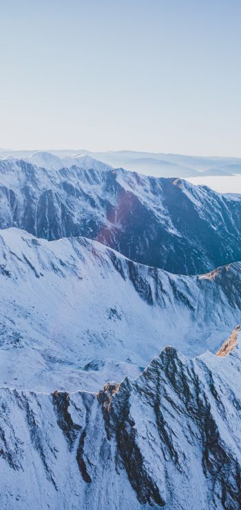 Обои 1440x3040 снег в горах, горы, зима, вид с дрона