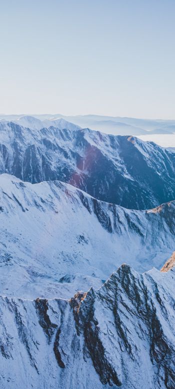 Обои 1440x3200 снег в горах, горы, зима, вид с дрона