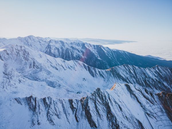snow in the mountains, mountains, winter, drone view Wallpaper 8000x6000