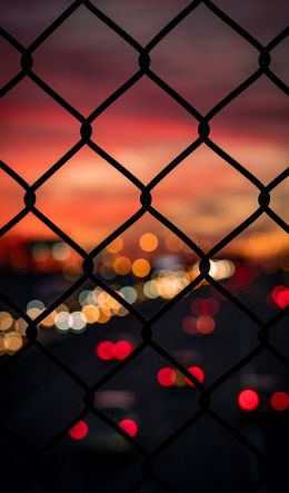 lattice, sunset, city lights Wallpaper 600x1024