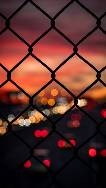 lattice, sunset, city lights Wallpaper 640x1136