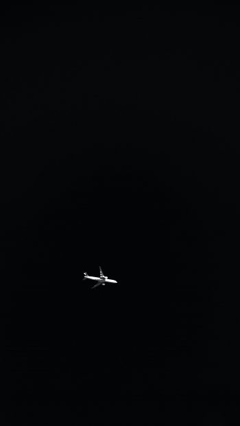 Обои 640x1136 самолет, ночь, черный фон