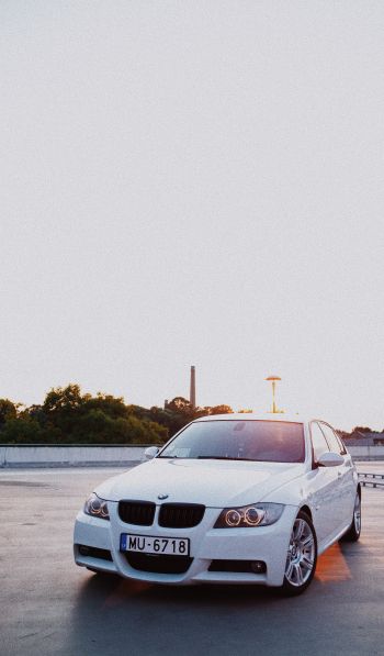 BMW, white car Wallpaper 600x1024