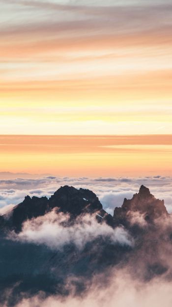 above the clouds, mountains, sky Wallpaper 750x1334