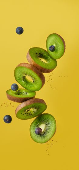 kiwi, blueberry, yellow background Wallpaper 828x1792