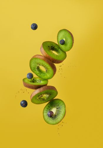 kiwi, blueberry, yellow background Wallpaper 1668x2388