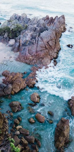 ocean, rocks, sand Wallpaper 1080x2220