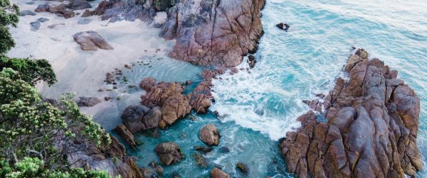 ocean, rocks, sand Wallpaper 3440x1440