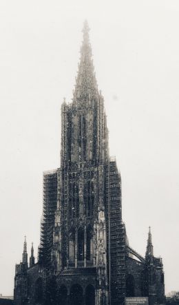 building, gray, snowfall Wallpaper 600x1024