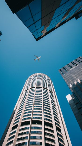 plane, buildings, height Wallpaper 640x1136