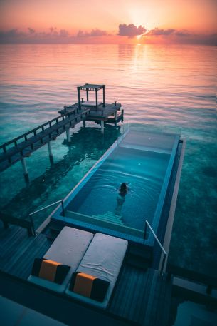 Maldives, sunset, swimming pool Wallpaper 3648x5472