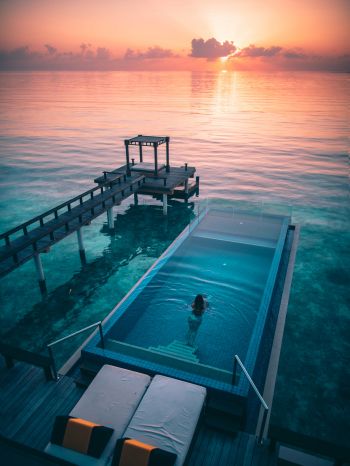 Maldives, sunset, swimming pool Wallpaper 1668x2224