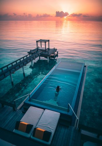 Maldives, sunset, swimming pool Wallpaper 1668x2388