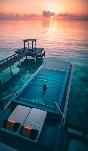 Maldives, sunset, swimming pool Wallpaper 600x1024