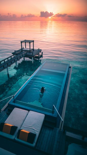 Maldives, sunset, swimming pool Wallpaper 640x1136