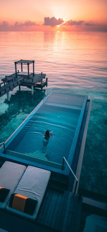 Maldives, sunset, swimming pool Wallpaper 1080x2340