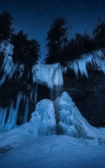 Обои 1752x2800 замерзший водопад, ночной лес, зима