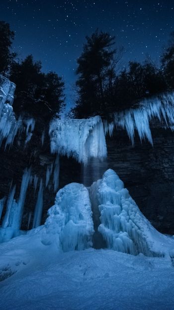 Обои 750x1334 замерзший водопад, ночной лес, зима