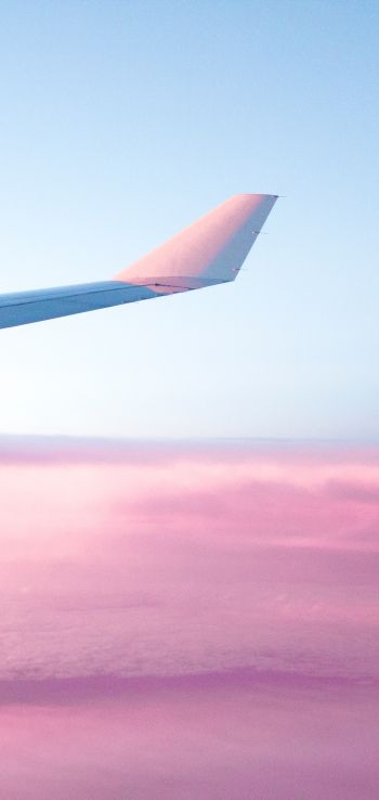 Обои 720x1520 крыло самолета, розовое небо, полет