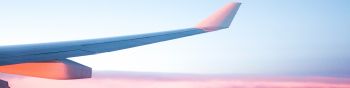 Обои 1590x400 крыло самолета, розовое небо, полет