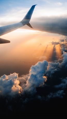 airplane wing, sunlight, flight Wallpaper 640x1136