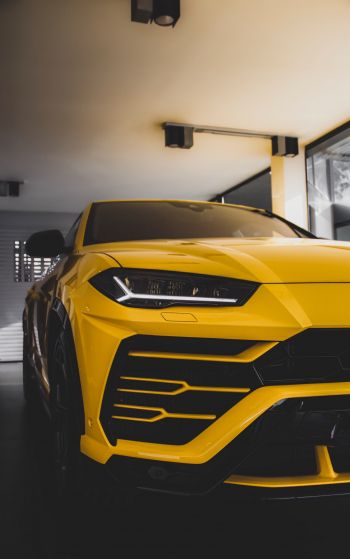 Обои 1752x2800 желтый Lamborghini Urus, внедорожник