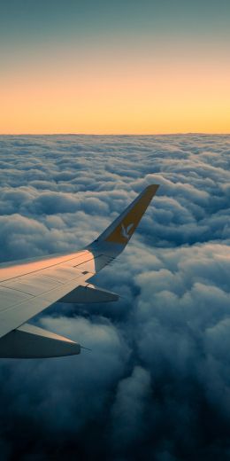 Ramadan, airplane wing, above the clouds Wallpaper 720x1440