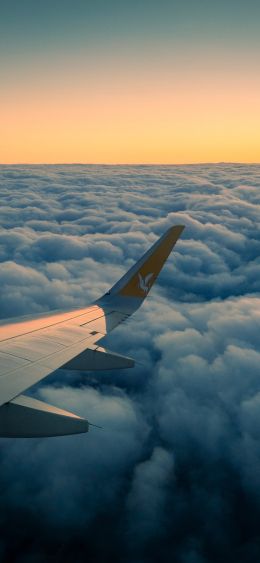 Ramadan, airplane wing, above the clouds Wallpaper 1080x2340