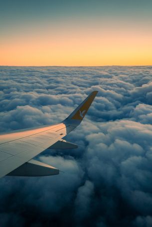 Ramadan, airplane wing, above the clouds Wallpaper 640x960