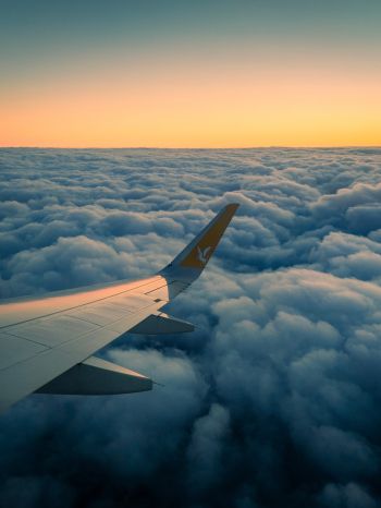 Ramadan, airplane wing, above the clouds Wallpaper 2048x2732