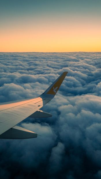 Ramadan, airplane wing, above the clouds Wallpaper 640x1136