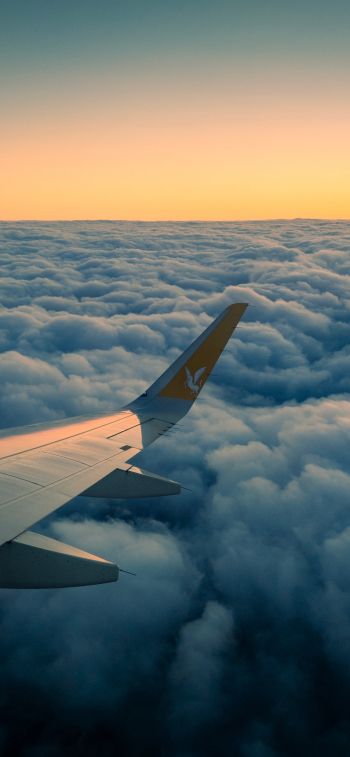 Ramadan, airplane wing, above the clouds Wallpaper 1125x2436